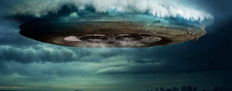 UFO/Alien spacecraft emerging from clouds